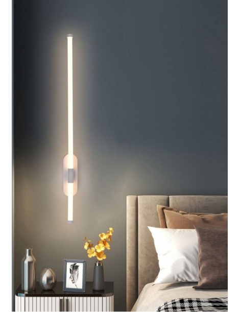 La lampada a sospensione in camera da letto fa luce al comodino